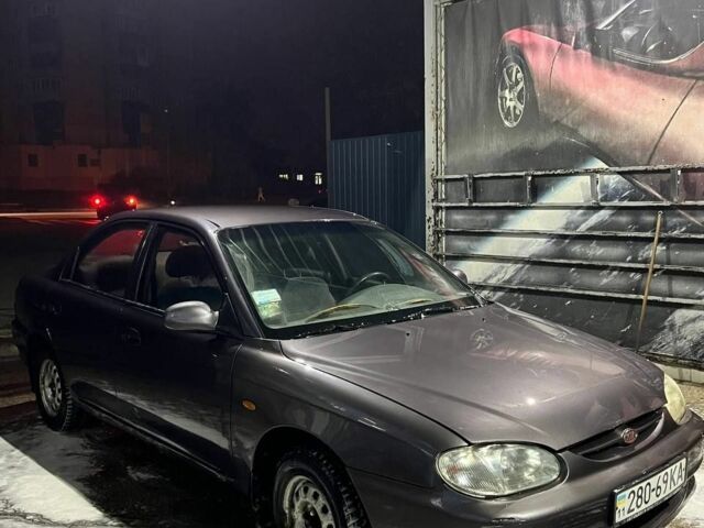 Фиолетовый Киа Сефия, объемом двигателя 1.5 л и пробегом 300 тыс. км за 2680 $, фото 3 на Automoto.ua