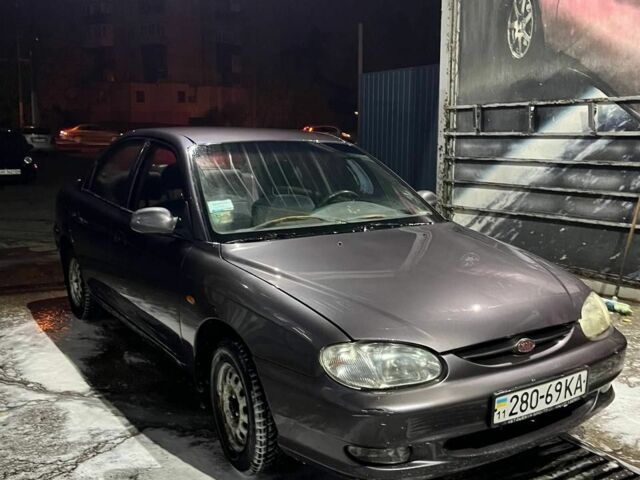 Фиолетовый Киа Сефия, объемом двигателя 1.5 л и пробегом 300 тыс. км за 2680 $, фото 2 на Automoto.ua