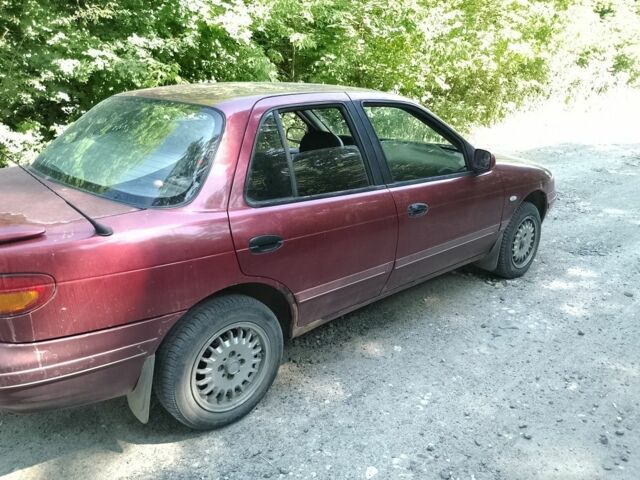 Красный Киа Сефия, объемом двигателя 1.5 л и пробегом 123 тыс. км за 850 $, фото 4 на Automoto.ua