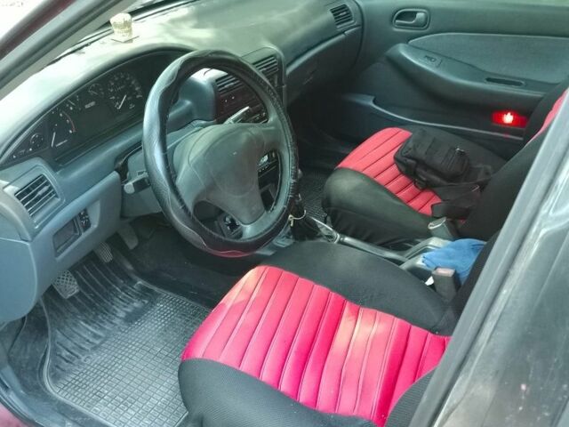 Красный Киа Сефия, объемом двигателя 1.5 л и пробегом 123 тыс. км за 850 $, фото 2 на Automoto.ua