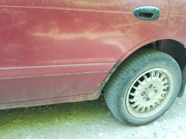 Красный Киа Сефия, объемом двигателя 1.5 л и пробегом 123 тыс. км за 850 $, фото 1 на Automoto.ua