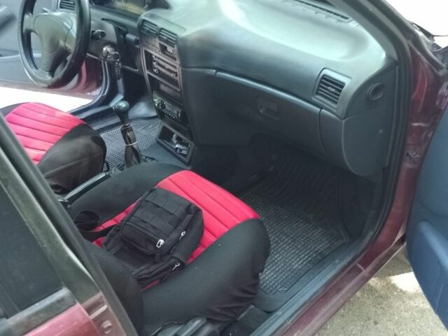 Красный Киа Сефия, объемом двигателя 1.5 л и пробегом 123 тыс. км за 850 $, фото 6 на Automoto.ua