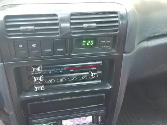 Красный Киа Сефия, объемом двигателя 1.5 л и пробегом 123 тыс. км за 850 $, фото 7 на Automoto.ua