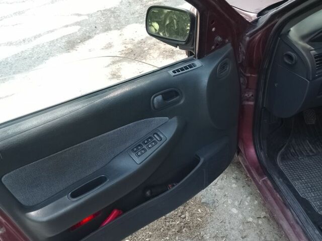 Красный Киа Сефия, объемом двигателя 1.5 л и пробегом 123 тыс. км за 850 $, фото 3 на Automoto.ua