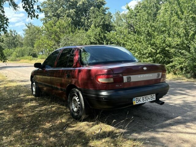 Червоний Кіа Сефія, об'ємом двигуна 1.6 л та пробігом 400 тис. км за 1200 $, фото 2 на Automoto.ua