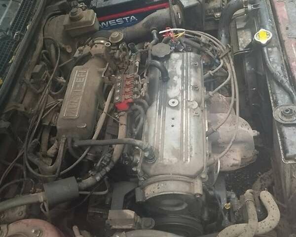 Красный Киа Сефия, объемом двигателя 1.5 л и пробегом 255 тыс. км за 1000 $, фото 1 на Automoto.ua