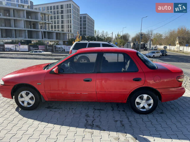 Красный Киа Сефия, объемом двигателя 1.6 л и пробегом 200 тыс. км за 1400 $, фото 4 на Automoto.ua