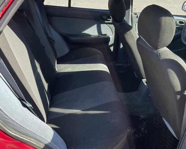 Красный Киа Сефия, объемом двигателя 1.6 л и пробегом 200 тыс. км за 1400 $, фото 18 на Automoto.ua