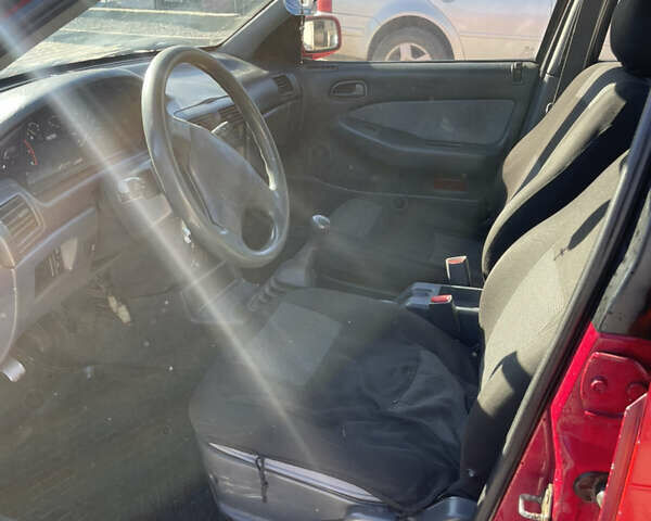 Красный Киа Сефия, объемом двигателя 1.6 л и пробегом 200 тыс. км за 1400 $, фото 15 на Automoto.ua