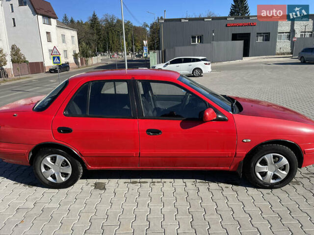 Красный Киа Сефия, объемом двигателя 1.6 л и пробегом 200 тыс. км за 1400 $, фото 1 на Automoto.ua