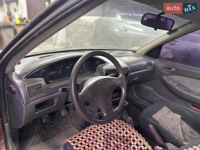 Червоний Кіа Сефія, об'ємом двигуна 1.6 л та пробігом 150 тис. км за 1000 $, фото 6 на Automoto.ua