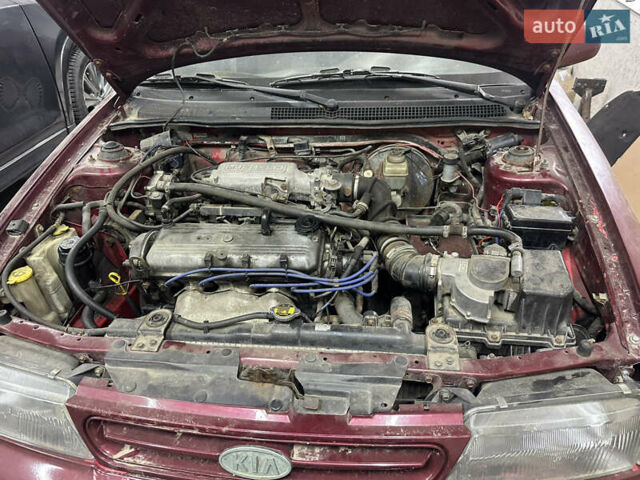 Червоний Кіа Сефія, об'ємом двигуна 1.6 л та пробігом 150 тис. км за 1000 $, фото 8 на Automoto.ua