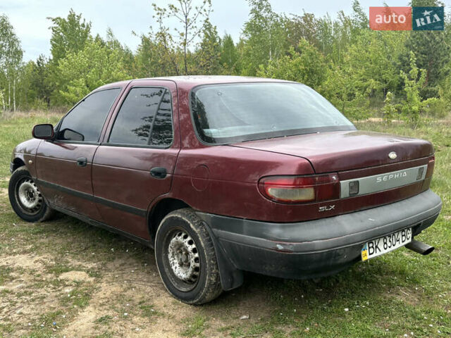 Красный Киа Сефия, объемом двигателя 1.6 л и пробегом 400 тыс. км за 1500 $, фото 3 на Automoto.ua