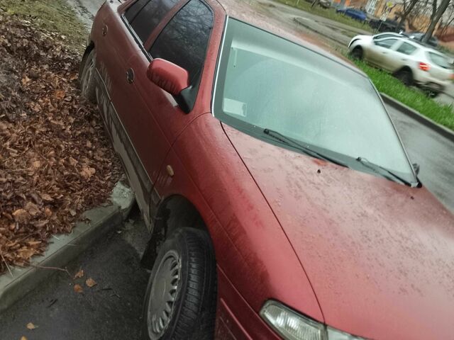 Красный Киа Сефия, объемом двигателя 1.6 л и пробегом 195 тыс. км за 474 $, фото 4 на Automoto.ua