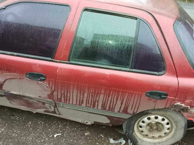 Красный Киа Сефия, объемом двигателя 1.6 л и пробегом 195 тыс. км за 474 $, фото 1 на Automoto.ua