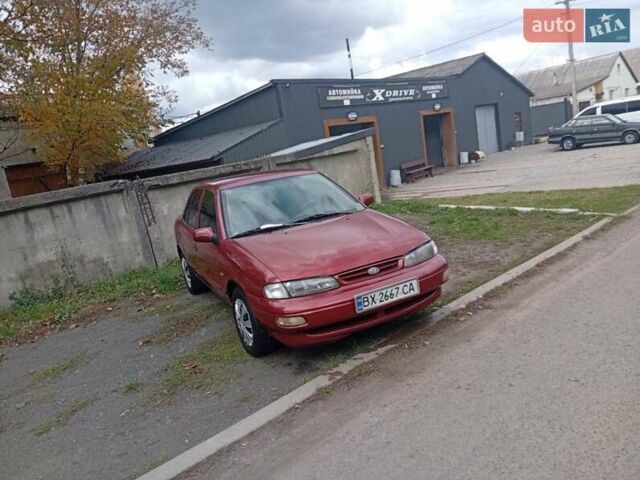 Красный Киа Сефия, объемом двигателя 1.5 л и пробегом 65 тыс. км за 1550 $, фото 6 на Automoto.ua