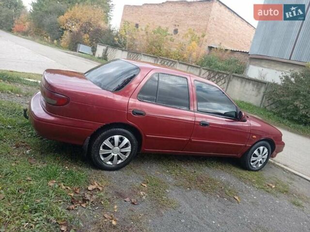 Красный Киа Сефия, объемом двигателя 1.5 л и пробегом 65 тыс. км за 1550 $, фото 7 на Automoto.ua