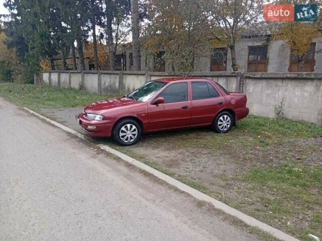 Красный Киа Сефия, объемом двигателя 1.5 л и пробегом 65 тыс. км за 1550 $, фото 5 на Automoto.ua