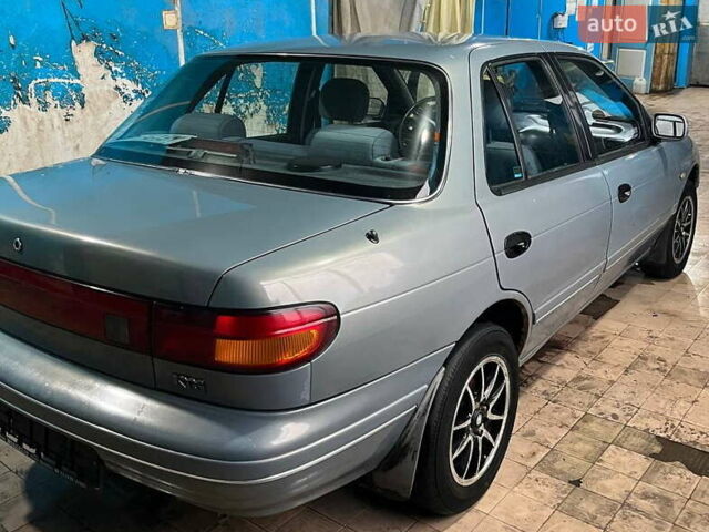 Серый Киа Сефия, объемом двигателя 1.6 л и пробегом 366 тыс. км за 2300 $, фото 2 на Automoto.ua