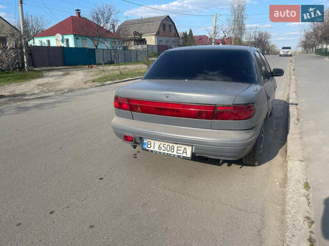 Серый Киа Сефия, объемом двигателя 1.6 л и пробегом 200 тыс. км за 1100 $, фото 3 на Automoto.ua