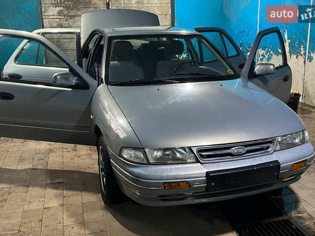 Серый Киа Сефия, объемом двигателя 1.6 л и пробегом 366 тыс. км за 2300 $, фото 1 на Automoto.ua