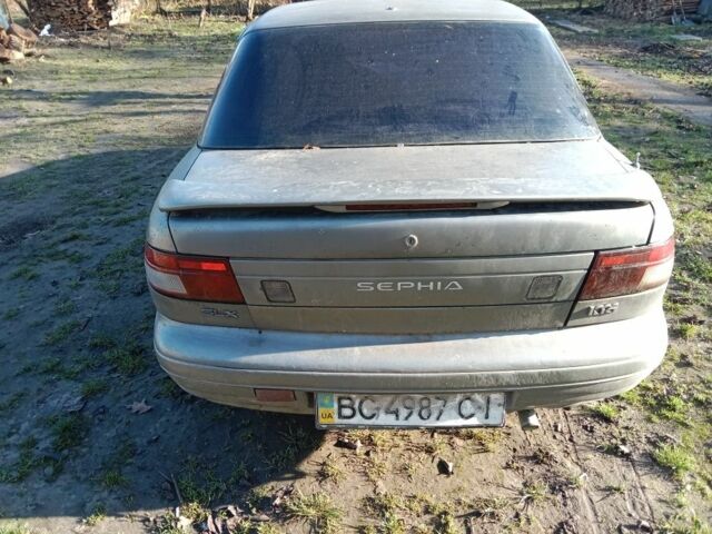 Серый Киа Сефия, объемом двигателя 1.5 л и пробегом 317 тыс. км за 710 $, фото 1 на Automoto.ua