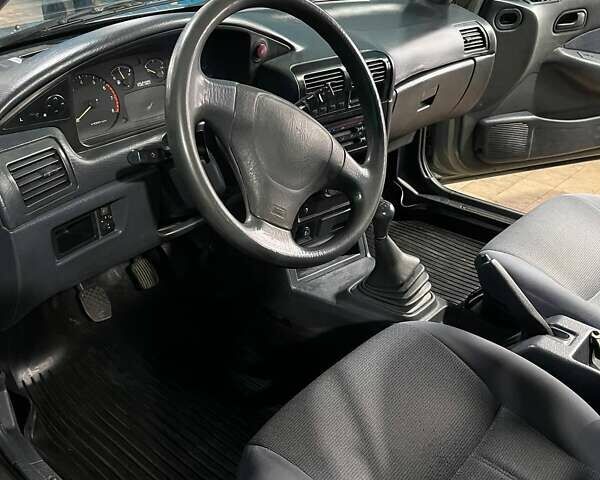 Серый Киа Сефия, объемом двигателя 1.6 л и пробегом 366 тыс. км за 2300 $, фото 3 на Automoto.ua