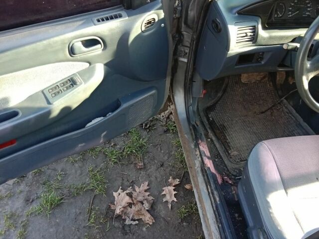 Серый Киа Сефия, объемом двигателя 1.5 л и пробегом 317 тыс. км за 710 $, фото 8 на Automoto.ua