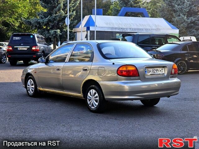Серый Киа Сефия, объемом двигателя 1.5 л и пробегом 247 тыс. км за 1999 $, фото 2 на Automoto.ua