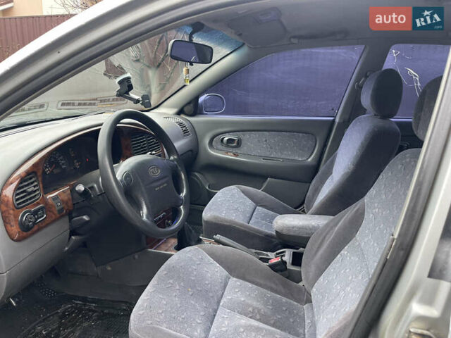 Серый Киа Сефия, объемом двигателя 1.6 л и пробегом 301 тыс. км за 1200 $, фото 7 на Automoto.ua