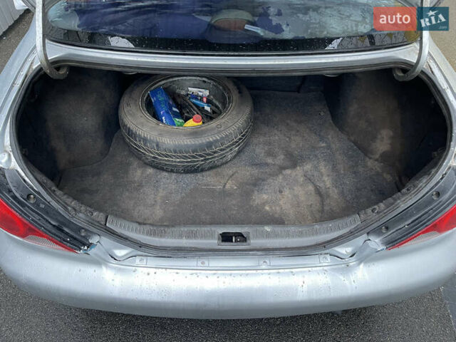 Серый Киа Сефия, объемом двигателя 1.6 л и пробегом 301 тыс. км за 1200 $, фото 15 на Automoto.ua
