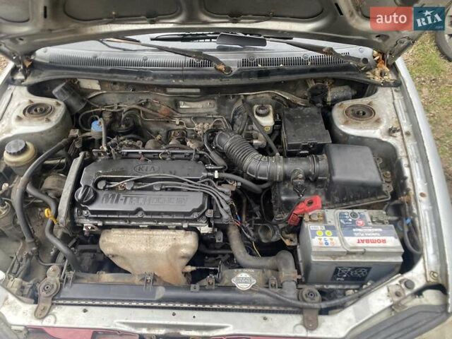 Серый Киа Сефия, объемом двигателя 1.59 л и пробегом 301 тыс. км за 950 $, фото 4 на Automoto.ua