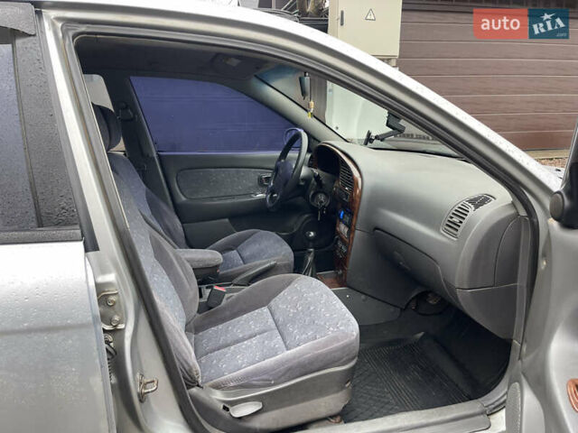 Серый Киа Сефия, объемом двигателя 1.6 л и пробегом 301 тыс. км за 1200 $, фото 12 на Automoto.ua