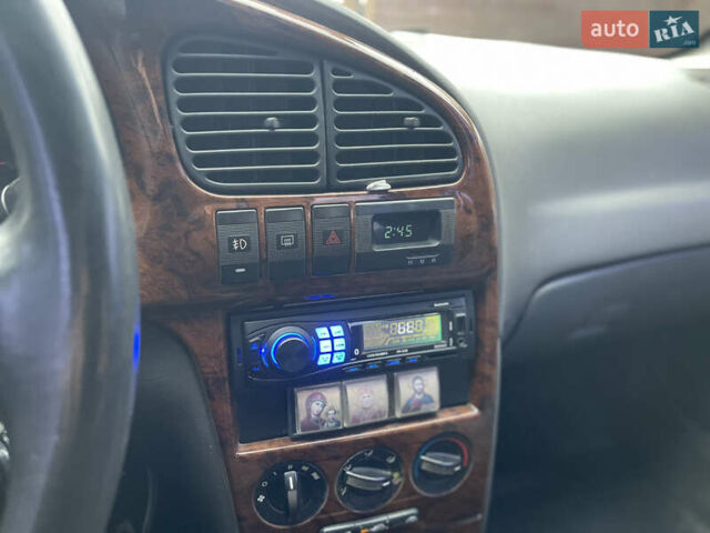 Серый Киа Сефия, объемом двигателя 1.6 л и пробегом 301 тыс. км за 1200 $, фото 9 на Automoto.ua