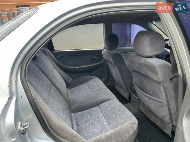 Серый Киа Сефия, объемом двигателя 1.6 л и пробегом 301 тыс. км за 1200 $, фото 14 на Automoto.ua