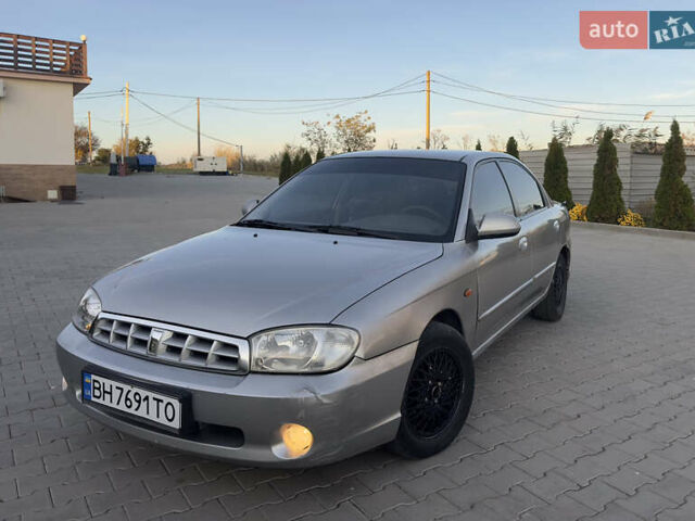 Серый Киа Сефия, объемом двигателя 1.59 л и пробегом 271 тыс. км за 2499 $, фото 1 на Automoto.ua