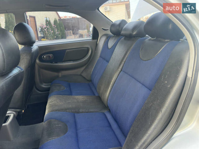 Серый Киа Сефия, объемом двигателя 1.59 л и пробегом 271 тыс. км за 2499 $, фото 11 на Automoto.ua