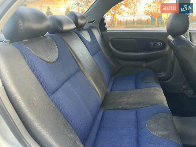 Серый Киа Сефия, объемом двигателя 1.59 л и пробегом 271 тыс. км за 2499 $, фото 13 на Automoto.ua