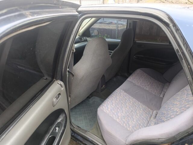 Синий Киа Сефия, объемом двигателя 1.8 л и пробегом 235 тыс. км за 1000 $, фото 5 на Automoto.ua