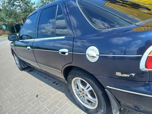 Синій Кіа Сефія, об'ємом двигуна 1.5 л та пробігом 145 тис. км за 1400 $, фото 3 на Automoto.ua