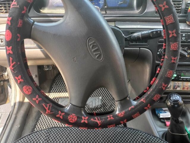 Синій Кіа Сефія, об'ємом двигуна 1.5 л та пробігом 145 тис. км за 1400 $, фото 2 на Automoto.ua