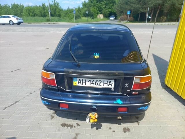 Синій Кіа Сефія, об'ємом двигуна 1.5 л та пробігом 145 тис. км за 1400 $, фото 7 на Automoto.ua