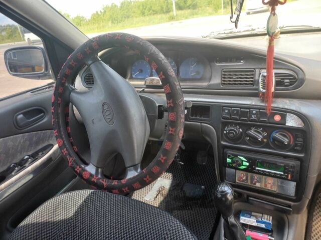 Синій Кіа Сефія, об'ємом двигуна 1.5 л та пробігом 145 тис. км за 1400 $, фото 6 на Automoto.ua