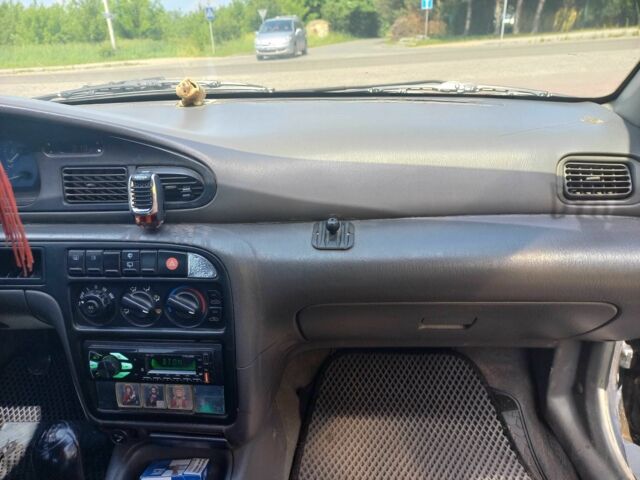 Синій Кіа Сефія, об'ємом двигуна 1.5 л та пробігом 145 тис. км за 1400 $, фото 5 на Automoto.ua