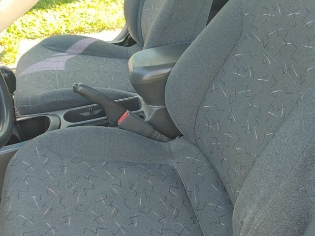 Синий Киа Сефия, объемом двигателя 1.5 л и пробегом 235 тыс. км за 1000 $, фото 6 на Automoto.ua