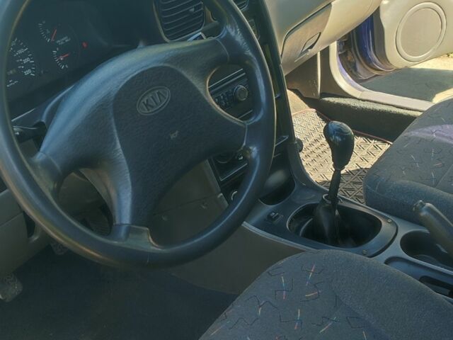 Синий Киа Сефия, объемом двигателя 1.5 л и пробегом 235 тыс. км за 1000 $, фото 2 на Automoto.ua