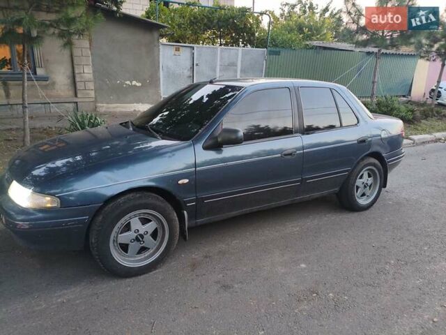 Синий Киа Сефия, объемом двигателя 1.6 л и пробегом 315 тыс. км за 1350 $, фото 4 на Automoto.ua