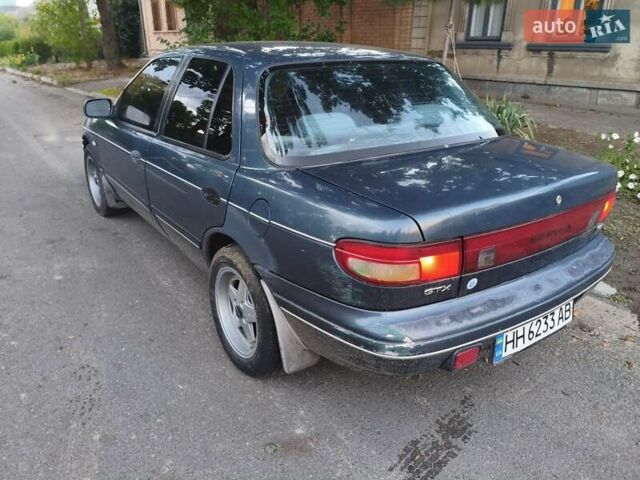 Синий Киа Сефия, объемом двигателя 1.6 л и пробегом 315 тыс. км за 1350 $, фото 9 на Automoto.ua