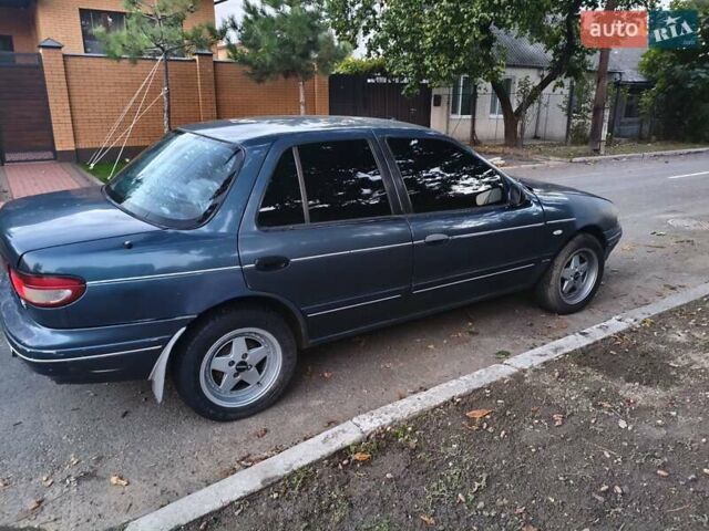 Синий Киа Сефия, объемом двигателя 1.6 л и пробегом 315 тыс. км за 1350 $, фото 6 на Automoto.ua