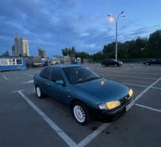 Синий Киа Сефия, объемом двигателя 1.6 л и пробегом 450 тыс. км за 800 $, фото 3 на Automoto.ua